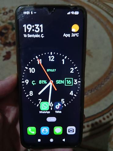 qaqa profil şəkilləri: Redmi smartfon - Arxa tərəf: dairəvi modulda 50 MP “2.0µm” əsas — 3