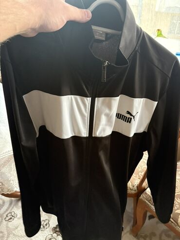 Köynəklər: Puma kişi idman jaketi - Rəng: qara, ön hissədə ağ zolaq - Model: tam