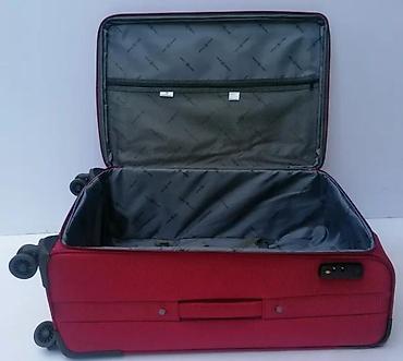 Putni koferi i torbe: Veliki putni kofer na točkiće – tekstilni, crvene boje - Prostrana — 3