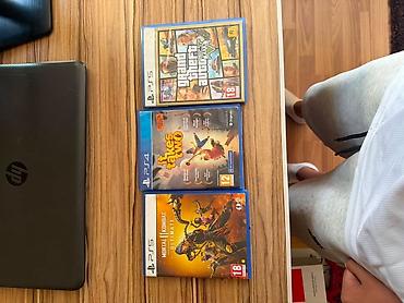 Диски с играми PlayStation: 1) Grand Theft Auto V — версия для PS5