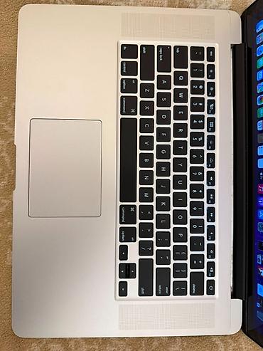 Apple MacBook: Apple MacBook Pro Retina 15" Mid 2015 | i7 | 16GB RAM | 512GB SSD — 10
