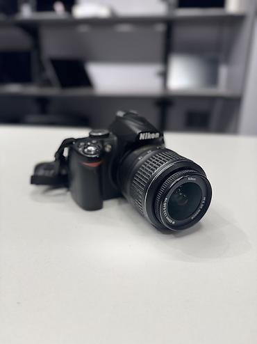 nikon d70s: Зеркальная камера Nikon D3000 с объективом AF‑S DX NIKKOR 18–55mm — 2
