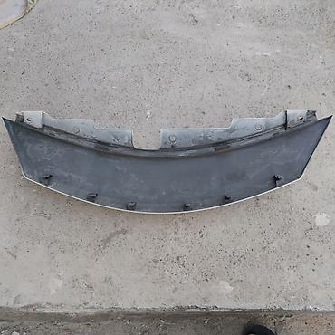 Ehtiyat hissələri: Nissan üçün yuxarı radiator barmaqlığı (GRILLE ASSY RAD, UPR) - Rəng — 2