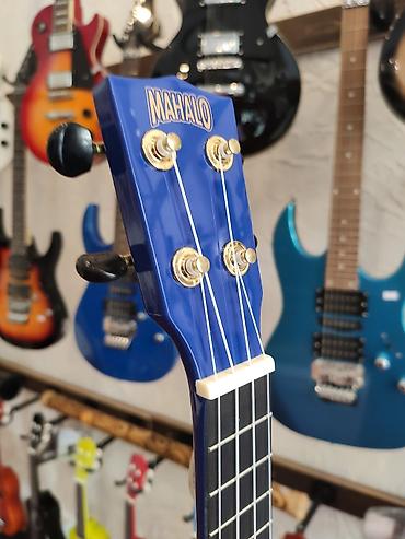Gitaralar: Mahalo MR1BUK Ukulele Simlərin sayı: 4 Üst:Sengon Qol:Jabon Çanta — 1