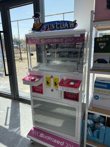 джойстик для: Хватайка (claw machine), которая является одним из видов аркадных