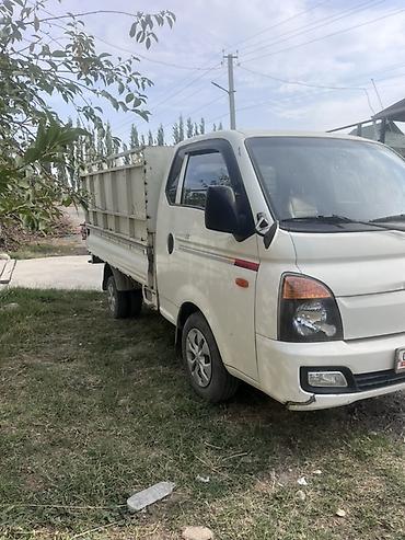 портерге тент: Hyundai Porter II, бортовой малотоннажный грузовик. Основные — 2