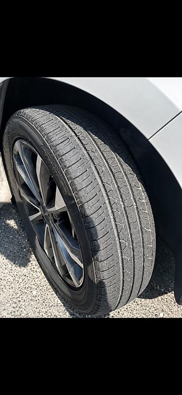 ford maşın: BYD Qin Plus DM-i (ağ sedan) – plug-in hibrid Xüsusiyyətlər: - GCU — 4