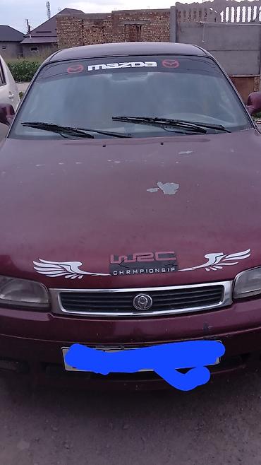 Mazda 626: 1994 г., Седан