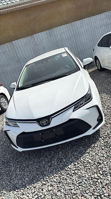 жили машина: Toyota Corolla: 2022 г., Гибрид, Седан — 9