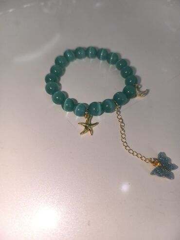 Bilərziklər: Məhsul: Əl işi daş muncuqlu elastik bilərziklər dəsti Təsvir: - Bir — 10