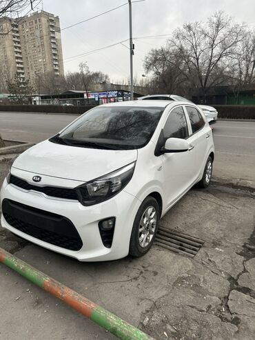 работа со своим авто: Компактный городской автомобиль Kia Morning в белом цвете. Эта
