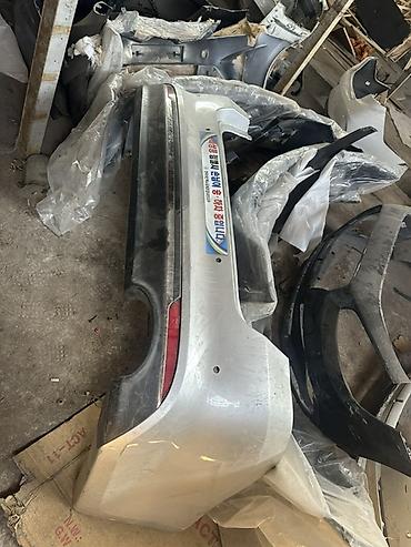 Бампер и комплектующие: Бампер Kia, Оригинал — 51