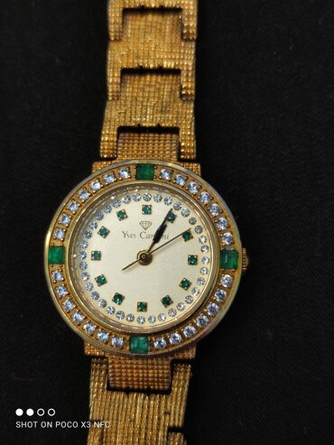 эксклюзивные швейцарские часы: Позолоченные фирменные часы из Германии с изумрудами и кристаллами