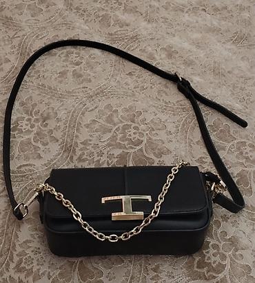kaşilok: Qara çiyin çantasi Çanta Tory Burch firmasinindi tezedi cemi 1 defe — 1
