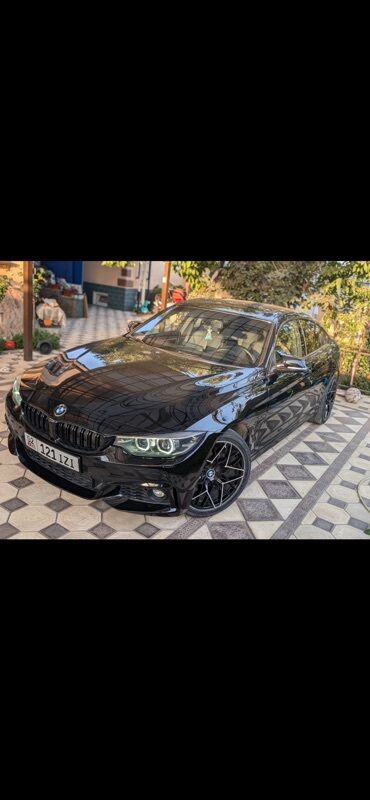 BMW: Чёрный BMW 430i Gran Coupe с тонированными окнами. Автомобиль оснащён