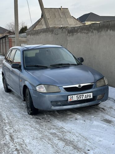 Mazda: Mazda 323: 1999 г., 1.5 л, Механика, Бензин, Универсал