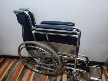 Инвалидные коляски: Инвалидная коляска