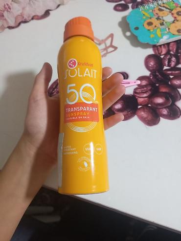 окшош кийимдер: Солнцезащитный спрей Kruidvat Solait SPF 50 - Прозрачный спрей — 1