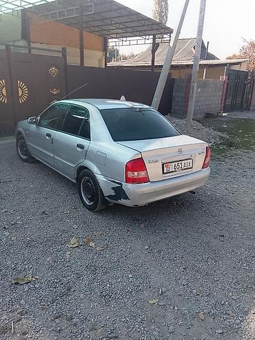 мазда 323 1999: Mazda 323: 2003 г., 1.3 л, Механика, Бензин, Седан — 4