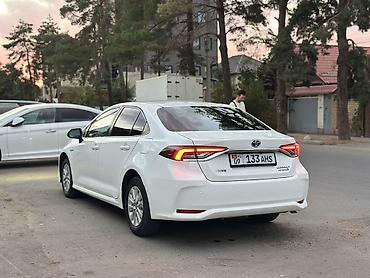 corola: Toyota Corolla: 2022 г., 1.8 л, Вариатор, Гибрид, Седан — 8
