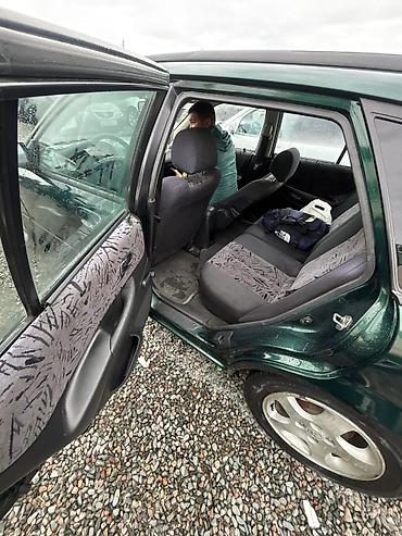 Mazda: Mazda 323: 2000 г., 1.6 л, Механика, Бензин, Универсал — 9
