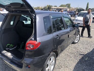мазда демио бишкек цена: Mazda Verisa, 5‑дверный хэтчбек темно‑серого цвета. Основные