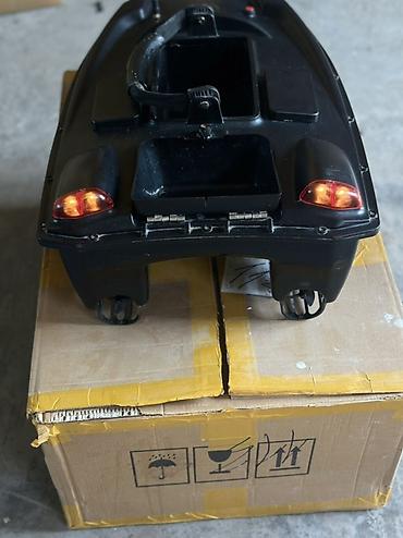 Прикормочные кораблики и кормушки: Кормораздаточная лодка для рыбалки (радиоуправляемая) - Двухпонтонный — 8