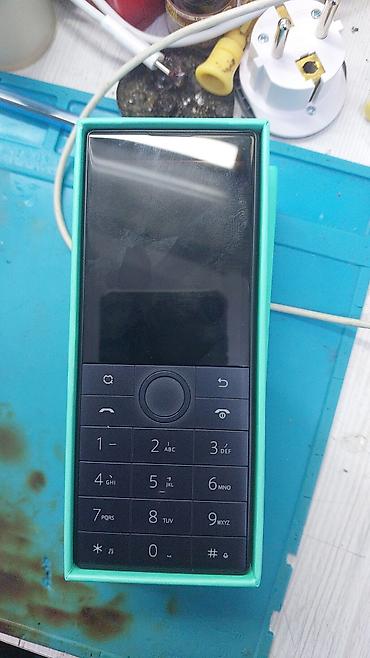 mini android telefonlar: DuoQin öğrenci telefonu – düyməli, kompakt və ağıllı funksiyalarla — 2