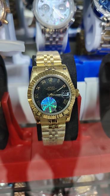 oyster saat: Rolex Oyster Perpetual Datejust – qızılı rəngdə qol saatları - — 9