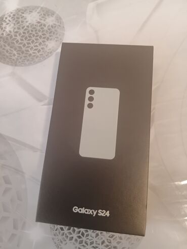 купить айфон се 2022: Samsung Galaxy S24, 256 ГБ, цвет - Серебристый, Беспроводная зарядка
