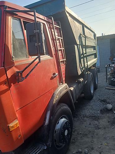 шлем танкистов: Самосвал КАМАЗ с трехосным шасси и металлическим кузовом большого — 1