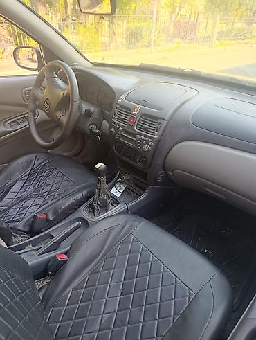 e6 3: Nissan Almera: 2000 г., 1.5 л, Механика, Бензин, Хэтчбэк — 7