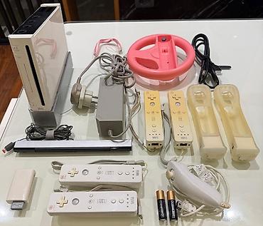 park sensor: Nintendo Wii (RVL-001) - 4 pult və 18 oyun diski İlk nəsil Nintendo — 2