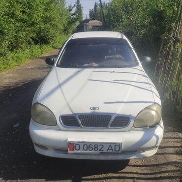 аккумулятор дордой: Daewoo Lanos белого цвета. Этот седан может быть использован как для
