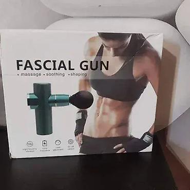 riz muzicki stub: Gun mini vibro-masažer za telo – kompaktan pištolj za dubinsku masažu — 1