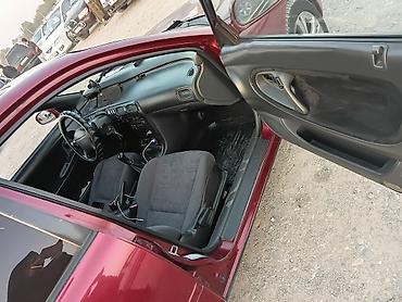 21 диски: Mazda 626: 1996 г., 2 л, Механика, Бензин, Хэтчбэк — 4