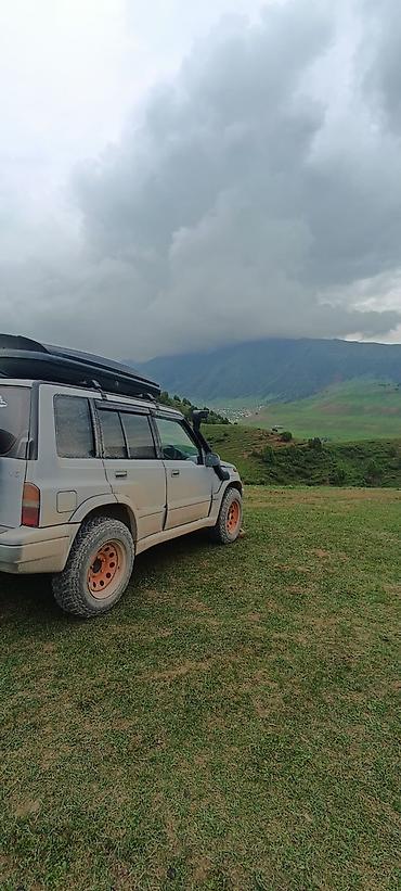 сузики эскудо: Suzuki Escudo: 1996 г., 2 л, Автомат, Бензин, Внедорожник — 10