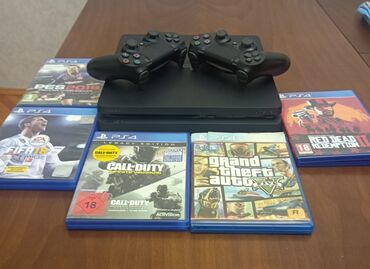 ikinci el ps4: Ps4 slim 1 tb 12 oyun 5 disk 2 pult