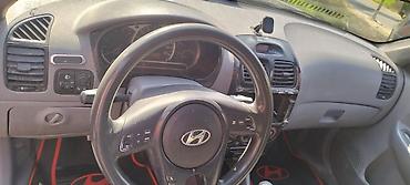 pər: Hyundai Accent: 1.5 l | 2005 il Sedan — 7