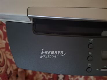 мфу 3 в 1: Многофункциональное устройство Canon i-SENSYS MF4320d, объединяющее