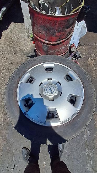 opel kolpak: 4 ədəd avtomobil təkəri və 1 ədəd Opel loqolu təkər qalpağı (kolpak) — 2