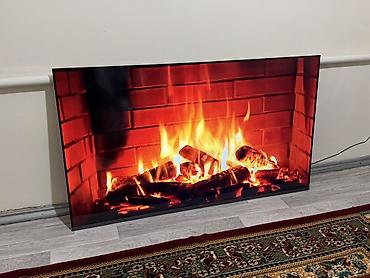 Смарт-телевизор LG OLED, крупная диагональ (ориентировочно 65")