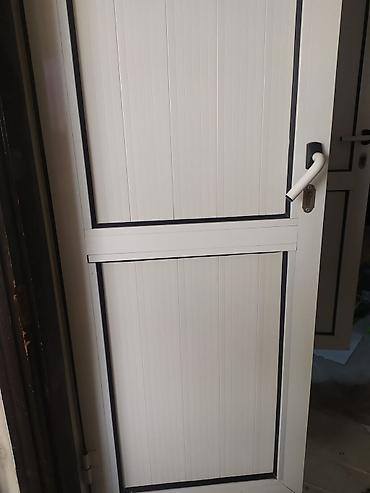 PVC plastik qapı - Material: PVC/profil karkaslı, panel tipli. -