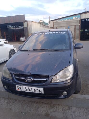 хундай ыстарекис: Субкомпактный автомобиль Hyundai Getz черного цвета с характерным