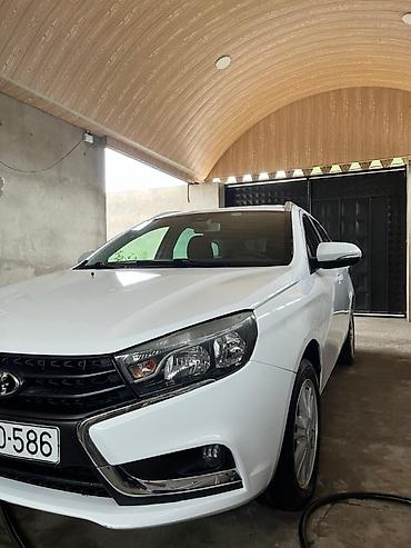 jac t8 ehtiyat hisseleri: Lada Vesta SW Cross, ağ rəng, universal kuzov. Texniki və dizayn — 5