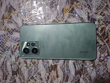 ps5 oyun yazılması: Xiaomi 12, 128 GB, rəng - Göy, 
 Sensor, Barmaq izi, İki sim kartlı — 4