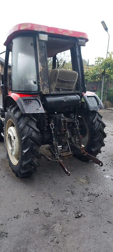 Kommersiya nəqliyyat vasitələri: YTO mini traktor – kabinli, 4 təkərli, arxa asqı sistemi və PTO çıxışı — 4