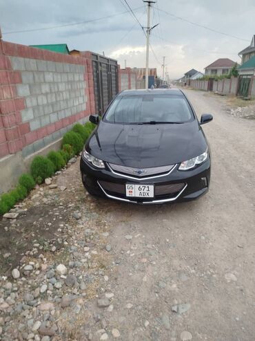 меняю на недвижимость: Электромобиль Chevrolet Volt черного цвета, предназначенный для