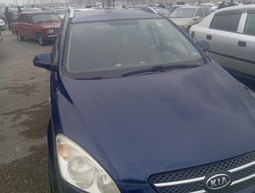 Kia: Kia cee’d SW (universal), tünd mavi rəng. - Kuzov: 5 qapılı — 10