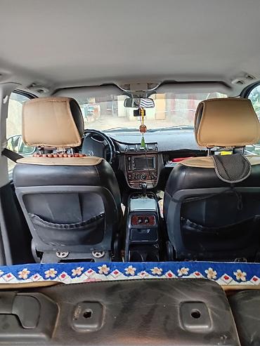 полный комплектация: Mercedes-Benz ML (W163) — интерьер и оснащение - Салон из черной — 3